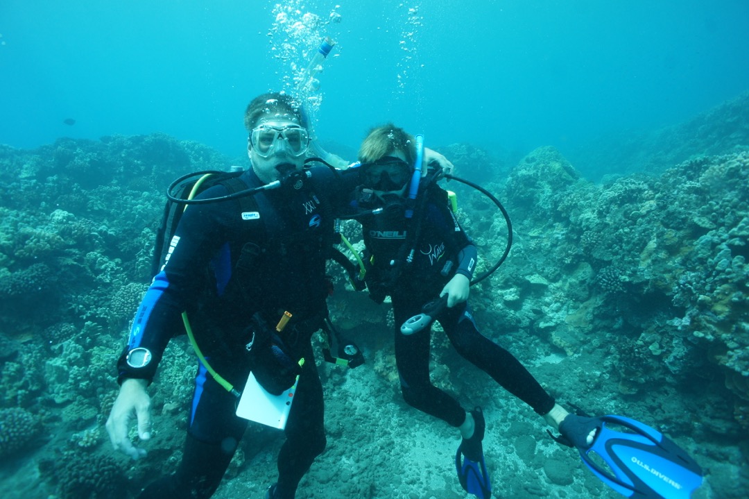 Devin and Dad on the sea floor